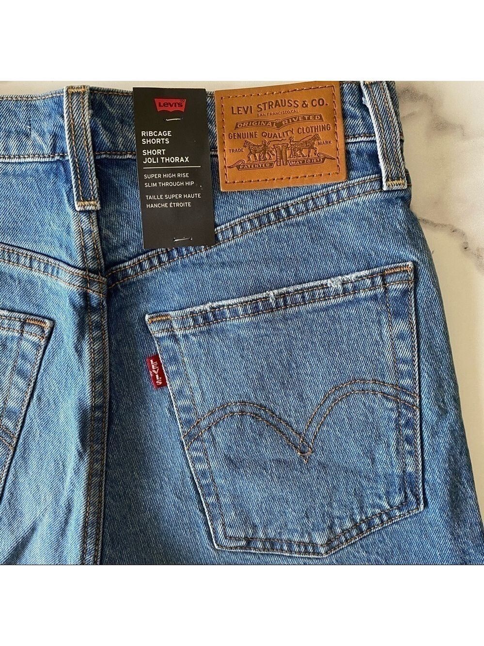 Levi’s Ribcage High Rise Raw Edge Jean Shorts - Picture 8 of 12